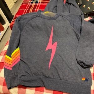 aviator Nation neon lightening bolt with stripes on sleeve and pant leg l/XL